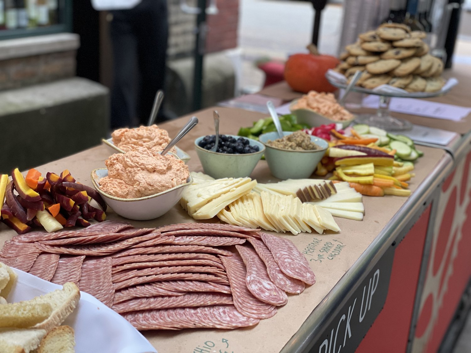 View of a catering table, full of cheese and charcuterie